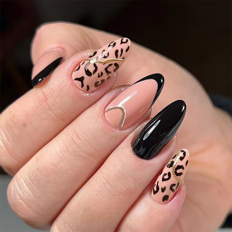 Safari Chic Medium Almond Press-on Nails with Black, Beige, and Leopard Print Design Featuring Gold Accents