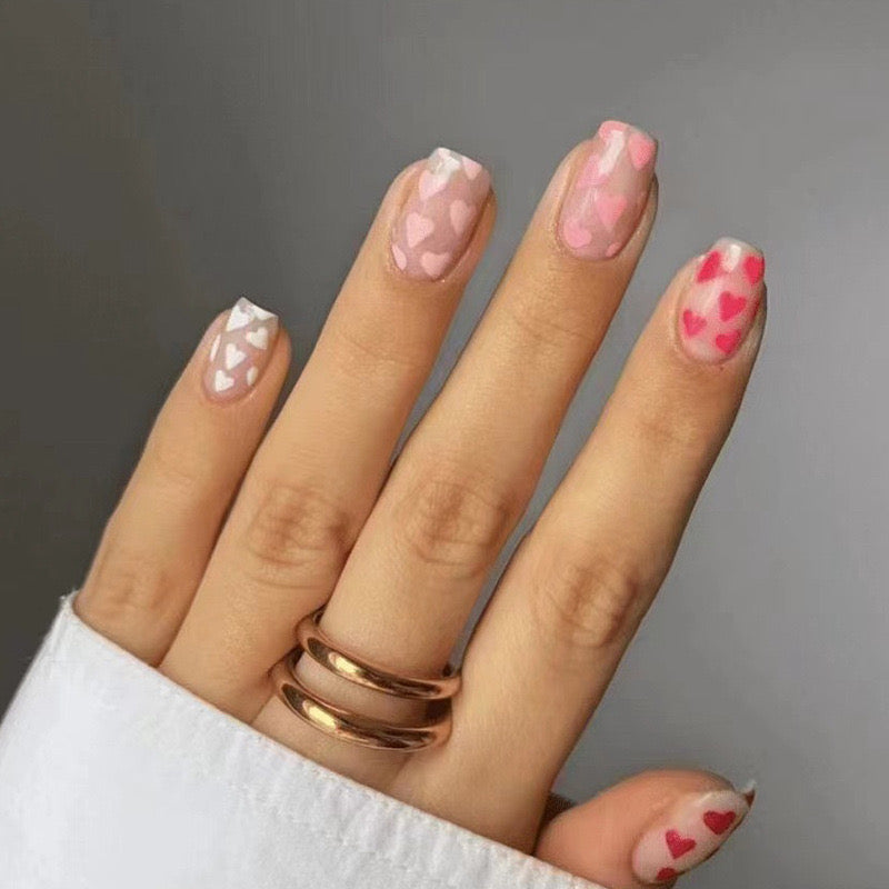 Whimsical Affair Medium Square Blush Pink Press-On Nails with Playful Heart Patterns