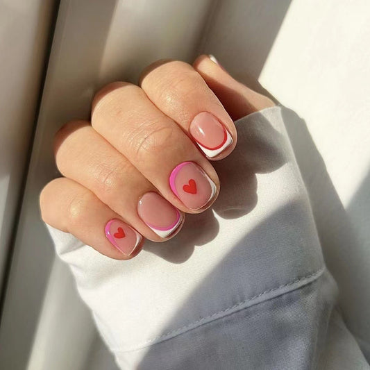 Romantic Rendezvous Short Squoval Pink Press-On Nails with Heart and French Tip Design