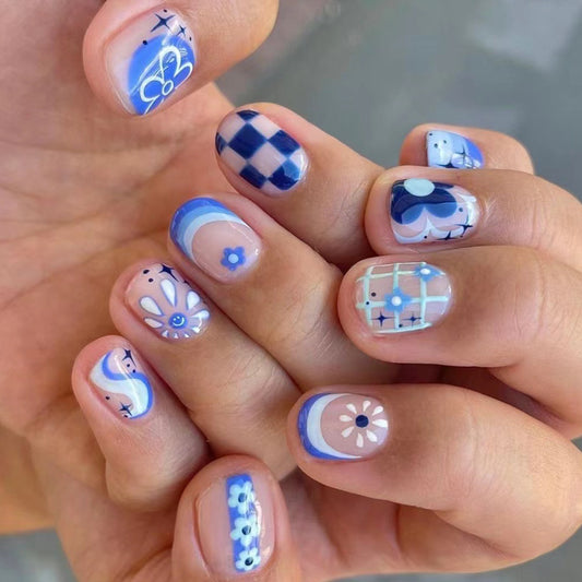 Whimsical Charm Short-Length Squoval Blue and White Designer Press-On Nail Set with Unique Pattern Accents