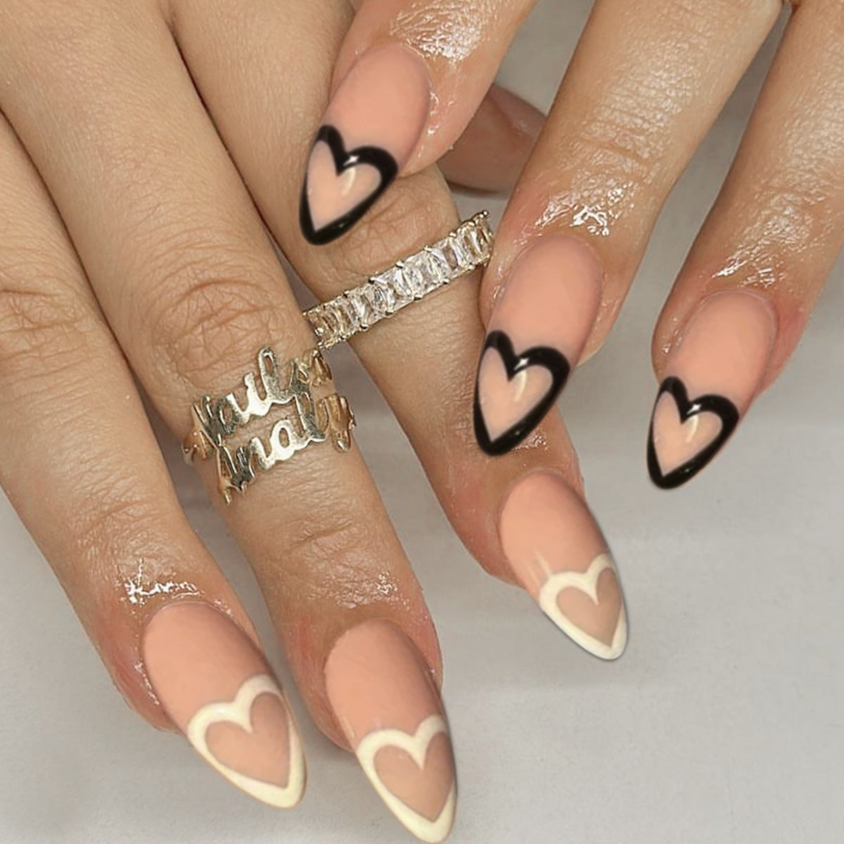 Romantic Affair Medium Almond Beige and Black Press On Nails with Heart Accents