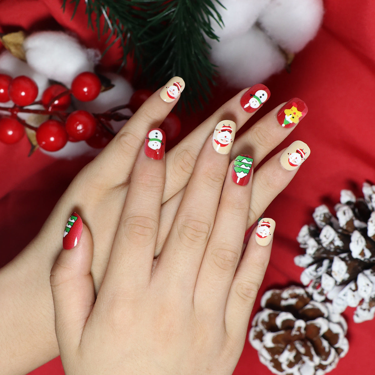 Yuletide Celebration Short Squoval Red Press-on Nail Set with Festive Santa and Snowman Designs