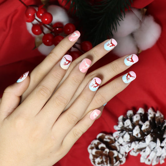 Winter Wonderland Short Length Squoval Press On Nails White and Pink with Festive Reindeer Accents