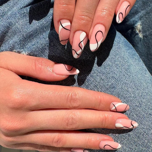 Bohemian Elegance Medium Almond-Shaped Beige Press-On Nails with Abstract Black Swirl Design