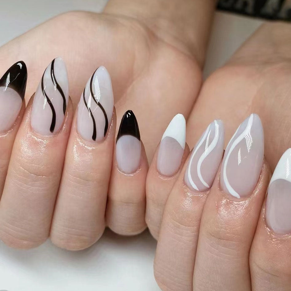 Elegant Swirl Magic Long Almond Press On Nails with Black and White Marble Design and Gloss Finish