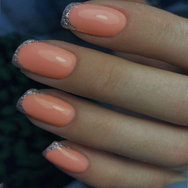 Elegant Peach Oasis Medium-Length Squoval Press-on Nails with Glitter Accents