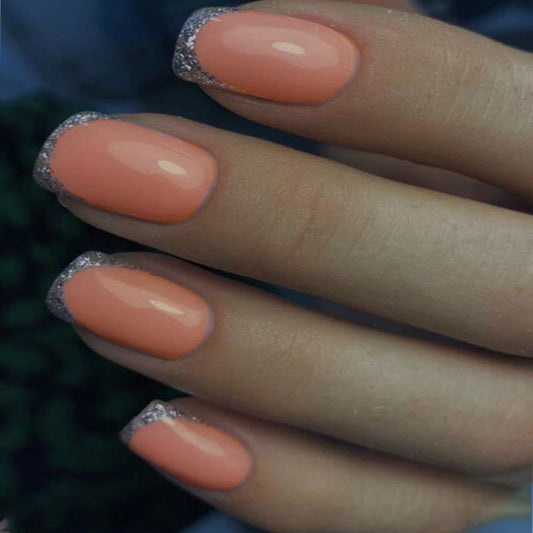 Elegant Peach Oasis Medium-Length Squoval Press-on Nails with Glitter Accents