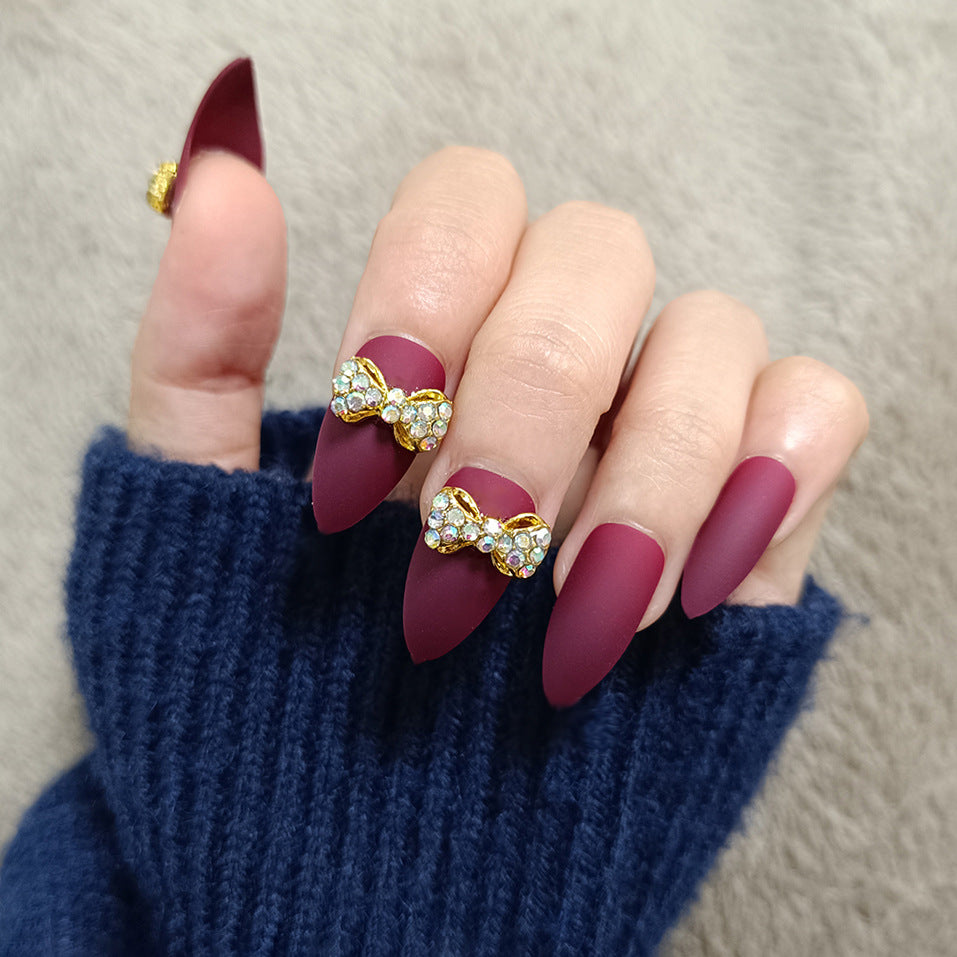 Elegant Evening Medium Almond Burgundy Press On Nails with Rhinestone Bow Accents