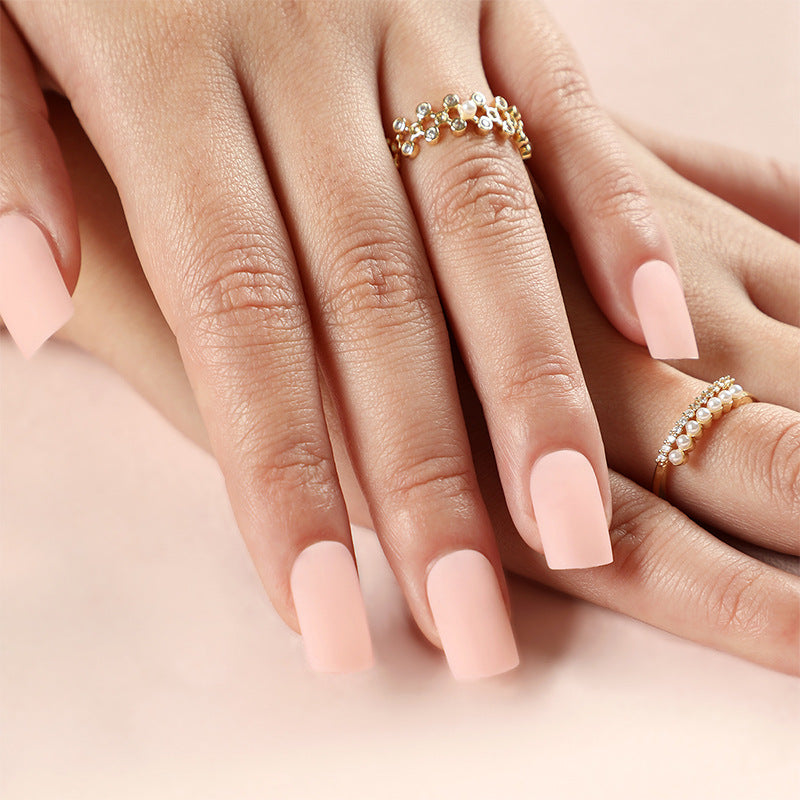 Blush Elegance Medium Coffin Matte Pink Press-on Nail Set with Durable Adhesive Tab Application