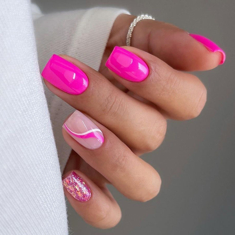 Hand with pink nail polish on a neutral background