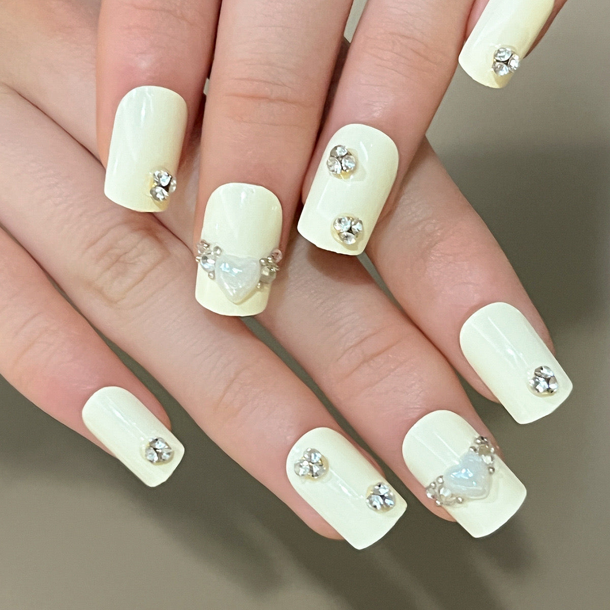 Classic Bridal Medium Squoval Cream Press-On Nails with Crystal Embellishments and Heart Design