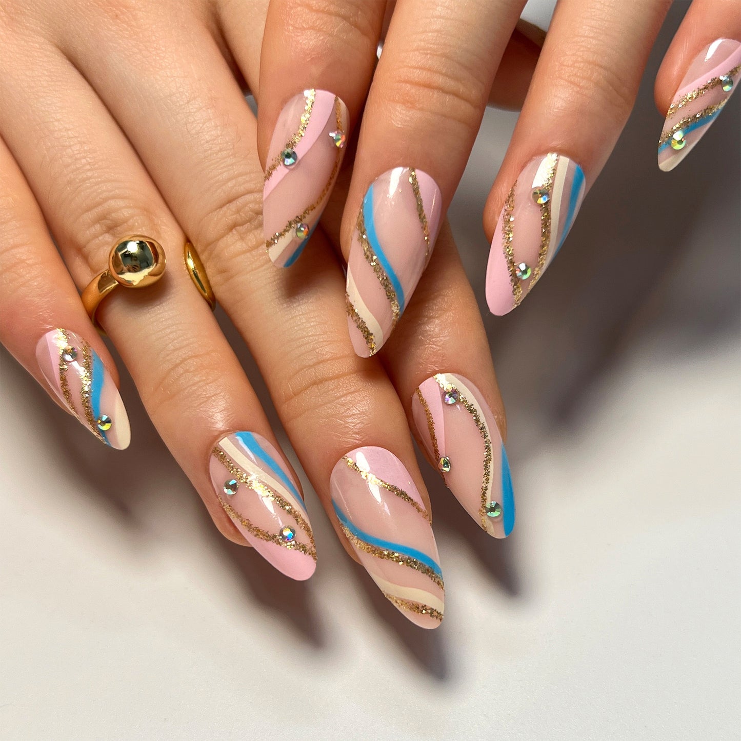 Summer Serenity Long Almond Pastel Pink and Blue Press-On Nails with Gold Glitter Swirls and Rhinestone Accents