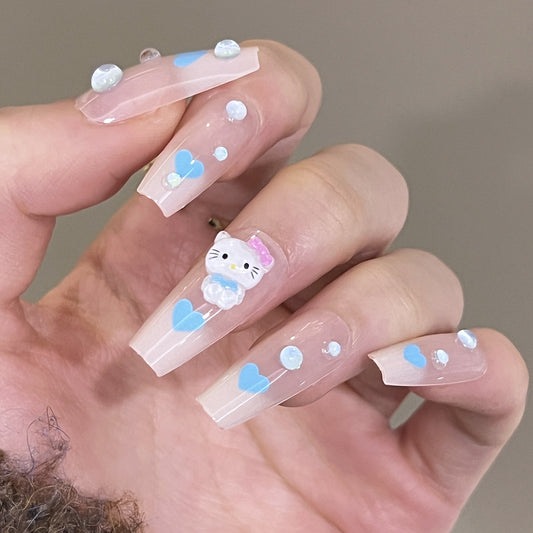 Playful Hearts Long Coffin Clear Press On Nail Set With Blue Hearts Bejeweled Cat Accent And Rhinestone Embellishments