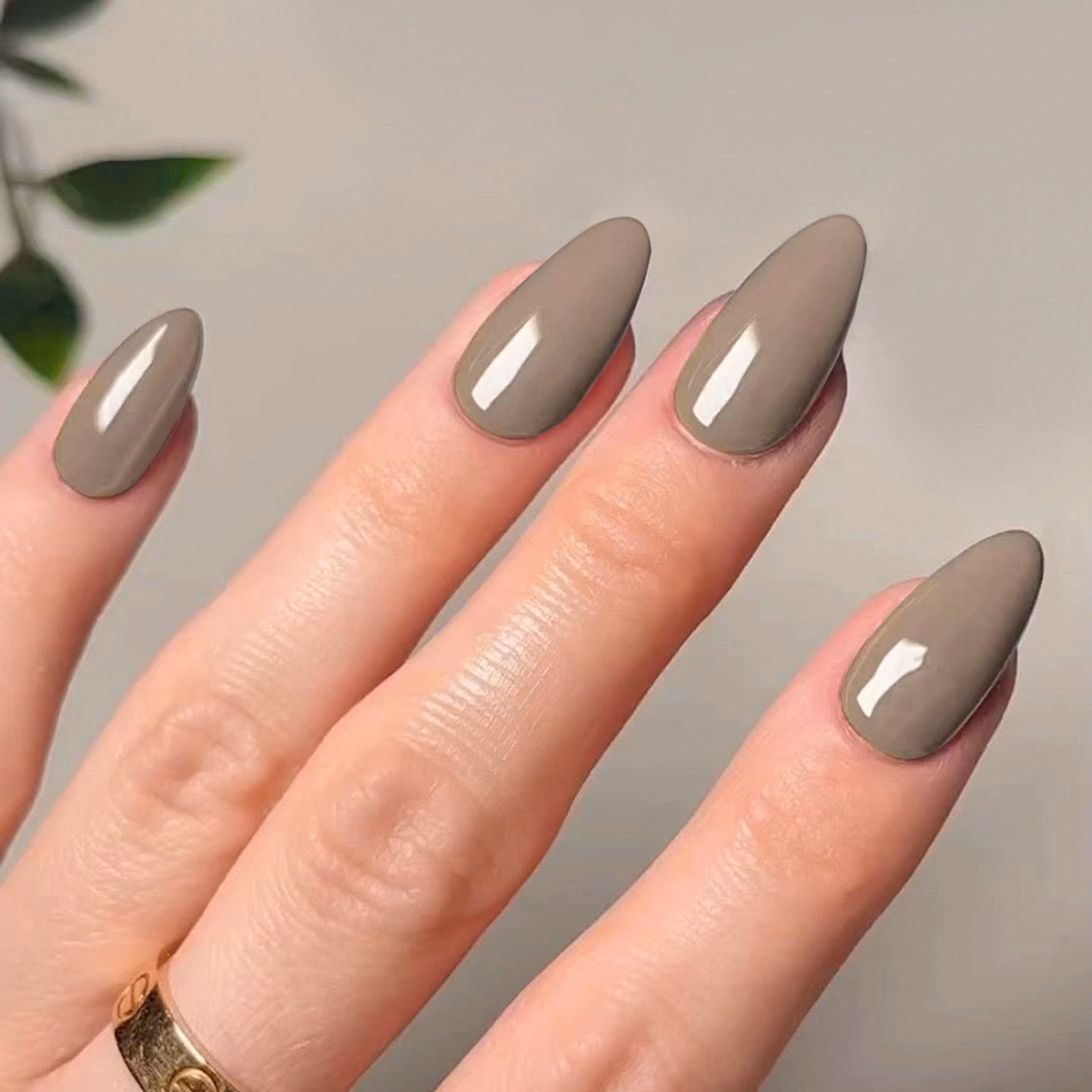 Sleek Medium Almond Press-On Nails in Muted Taupe for an Elegant Everyday Look