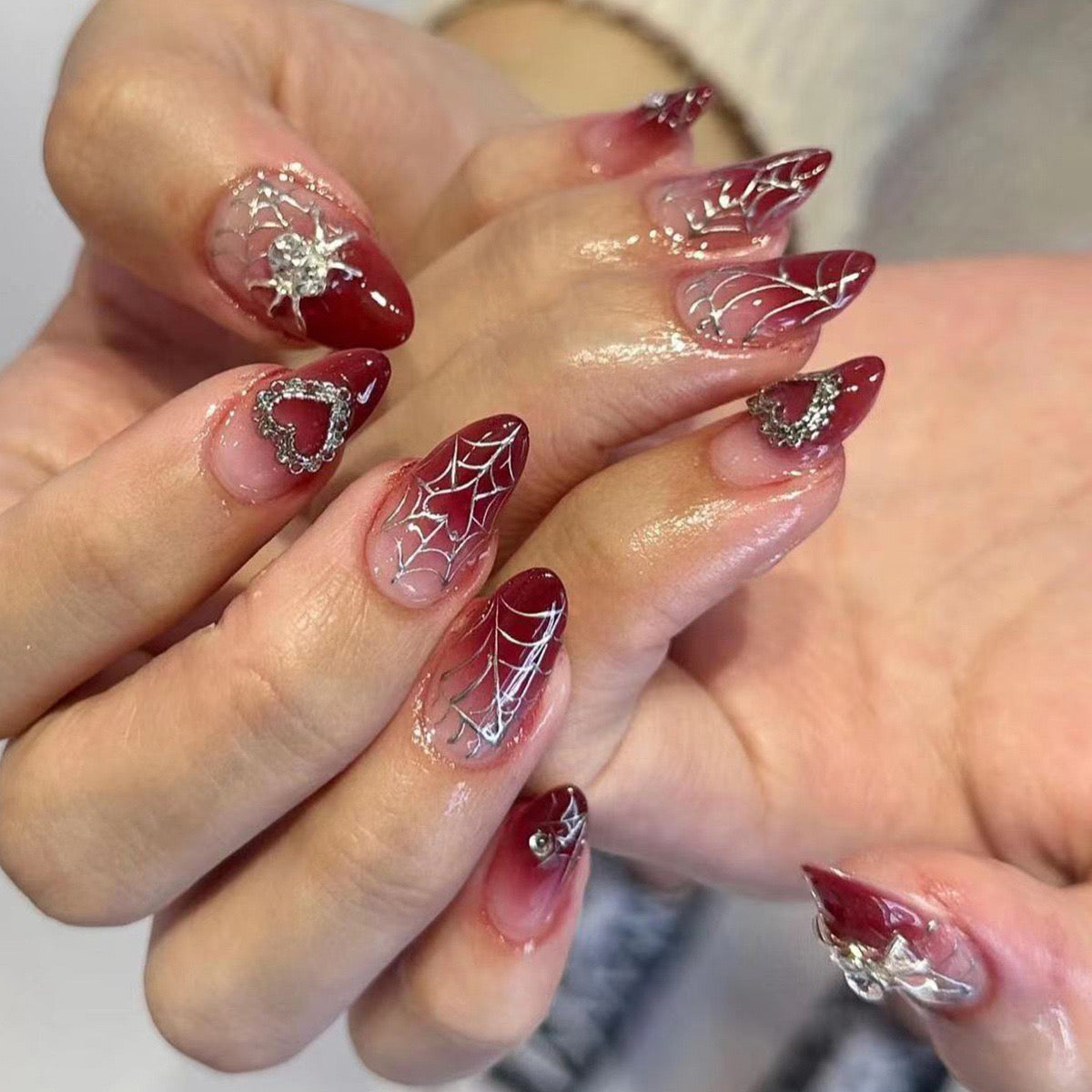 Enchanted Elegance Medium Almond Deep Red Press-On Nails with Silver Spiderweb Art