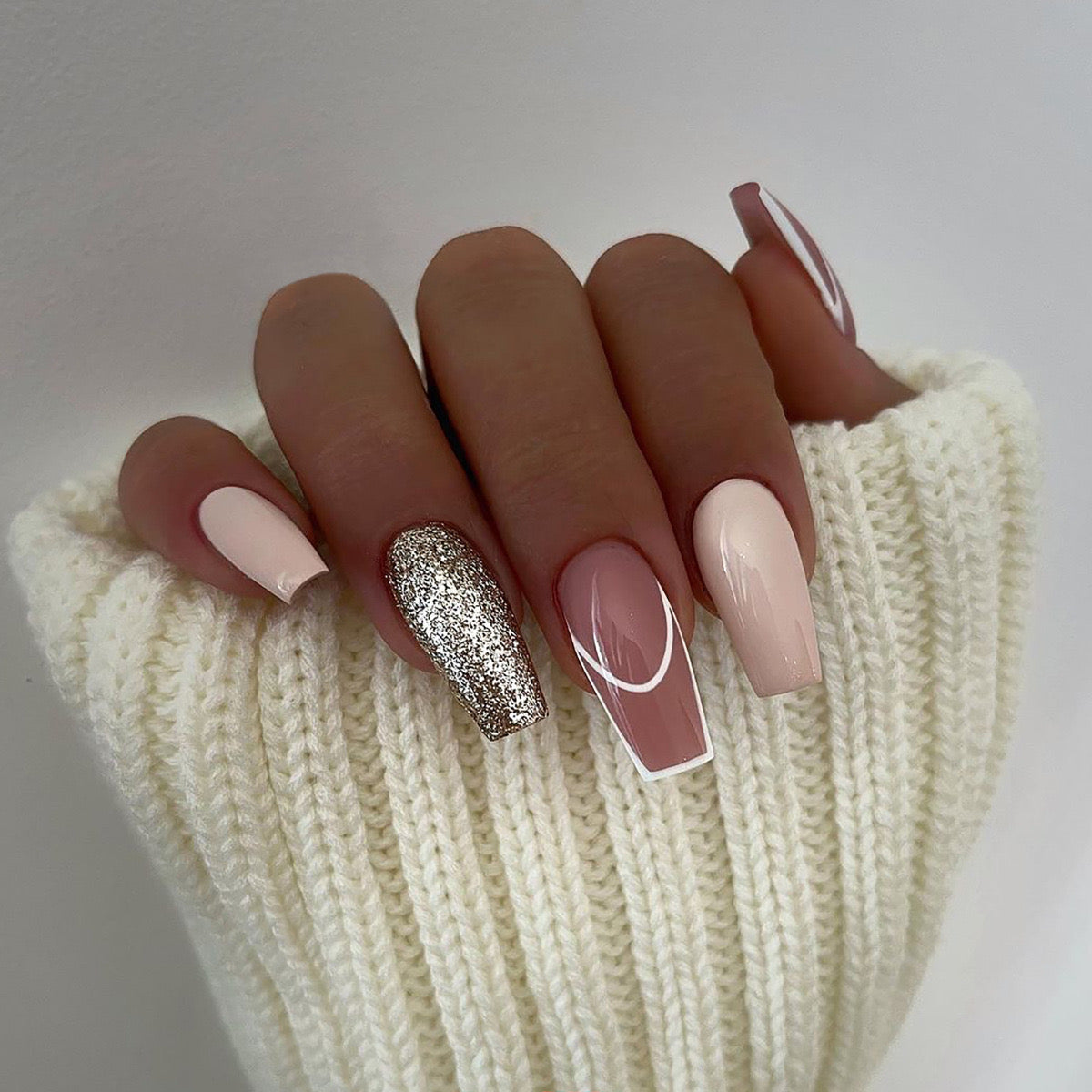 Cozy Glamour Long Coffin Beige Press-On Nails with White Art Detail and Glitter Accent Nail