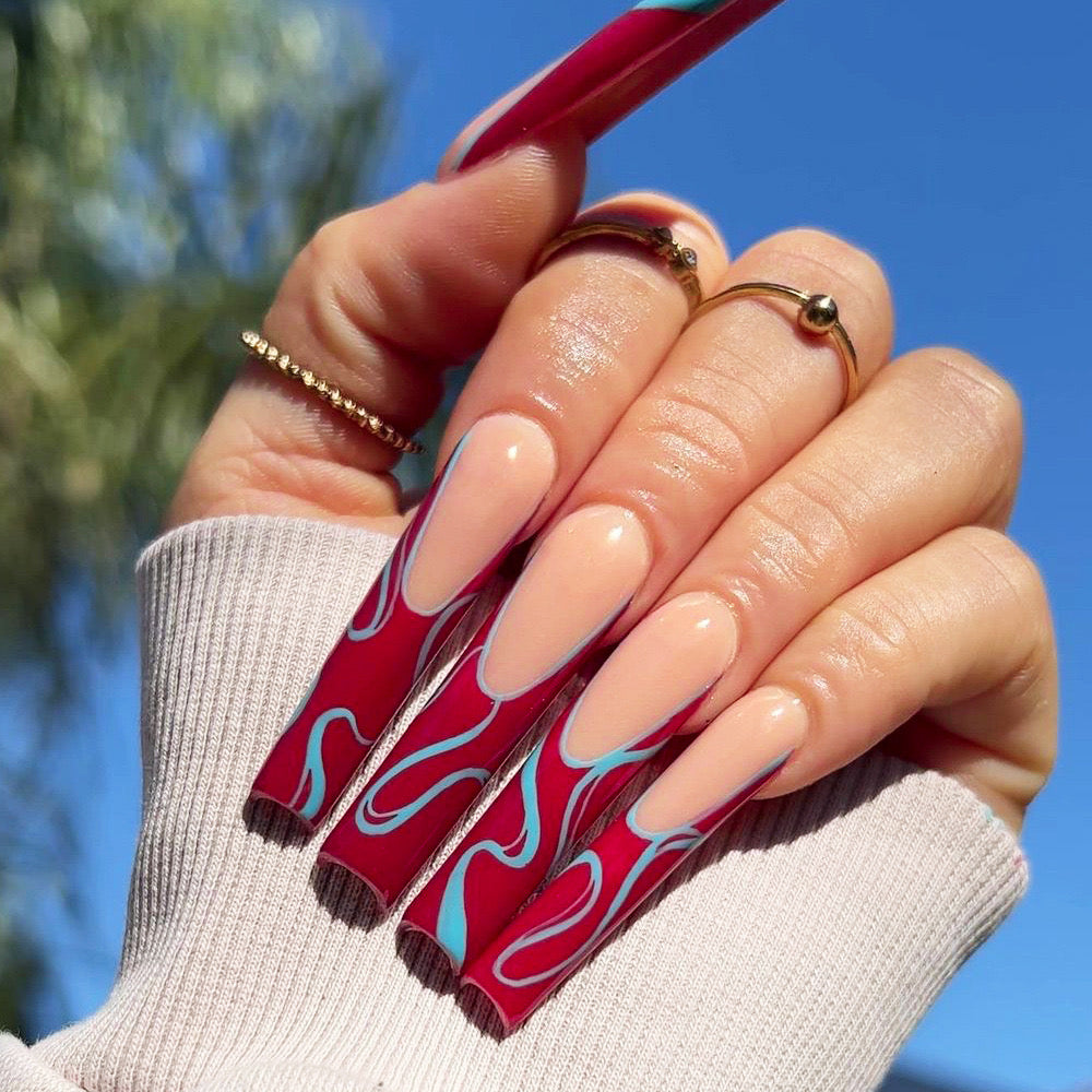 Flamenco Flair Long Coffin Beige Press-On Nails with Swirling Red and Teal Accents