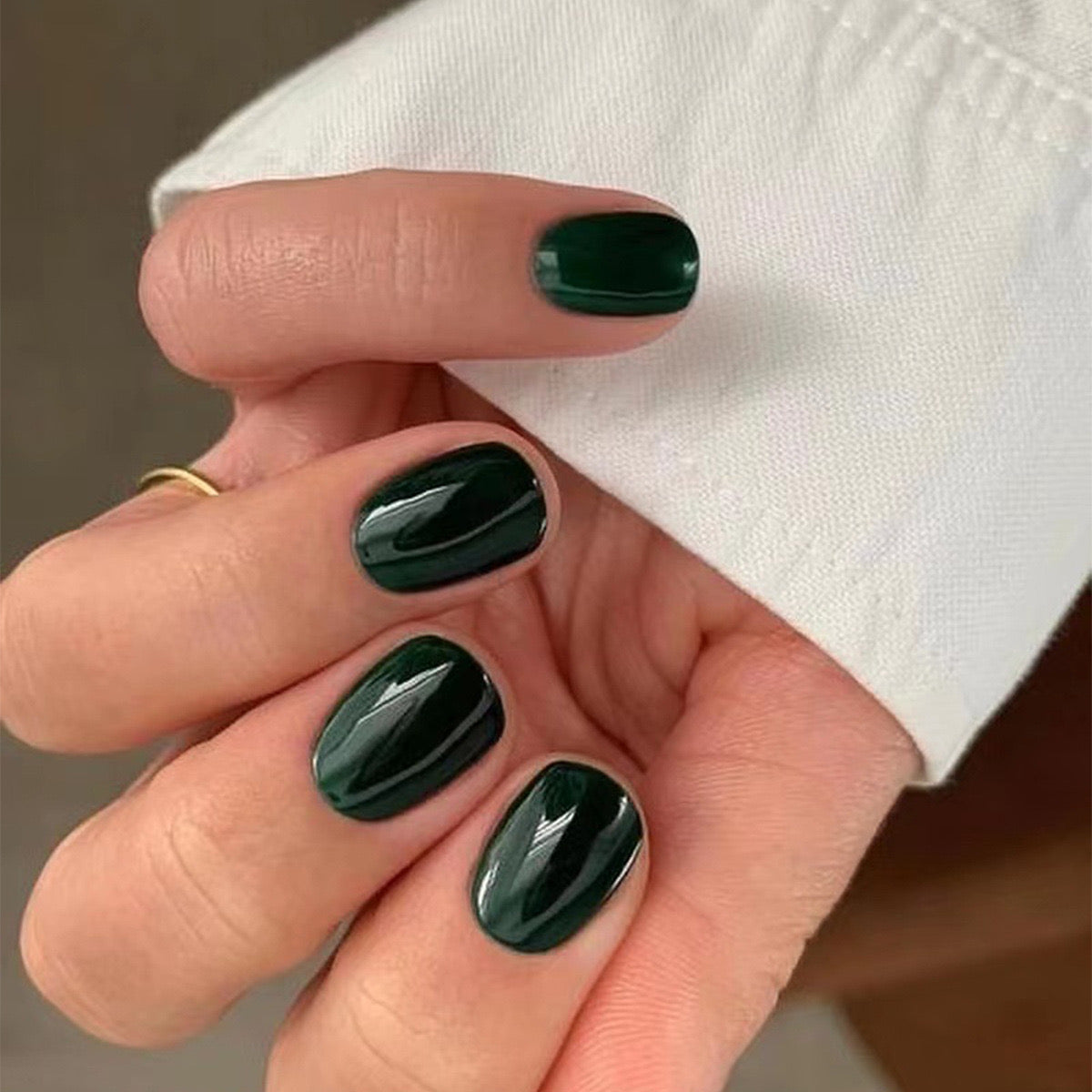 Elegant Short Squoval Emerald Green Press-On Nails with High Shine
