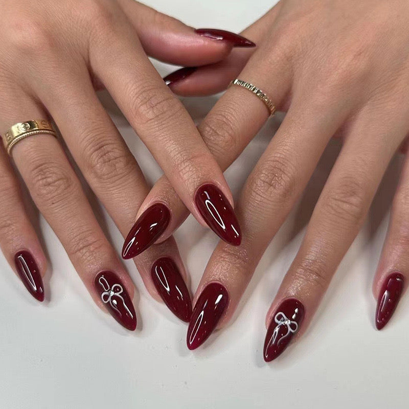 Elegant Affair Extra Long Stiletto Deep Cherry Press-On Nails with Dainty Bow Accents