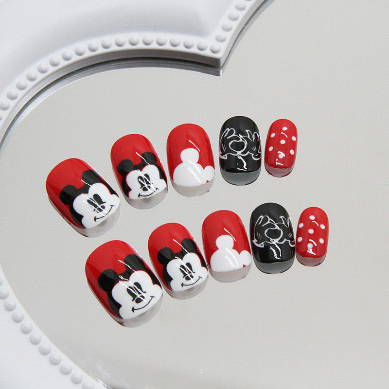 Cartoon Inspired Short Round Red Black And White Press On Nail Set With Character Silhouettes And Polka Dot Accents