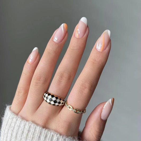 Hand with stylish nail polish and rings on a neutral background