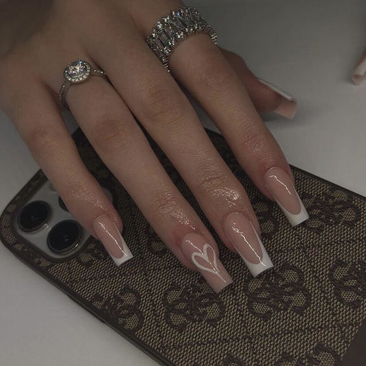 Elegant Romance Long Coffin French Tip Press on Nail Set with Beige Base and White Heart Accent