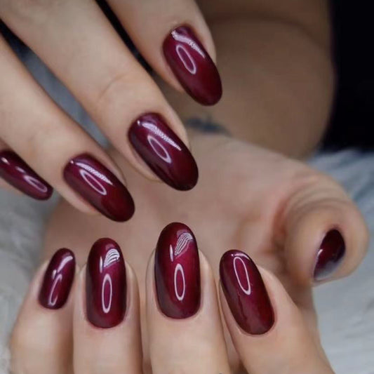 Vintage Elegance Medium Oval Burgundy Press On Nails with Accent Feather Design