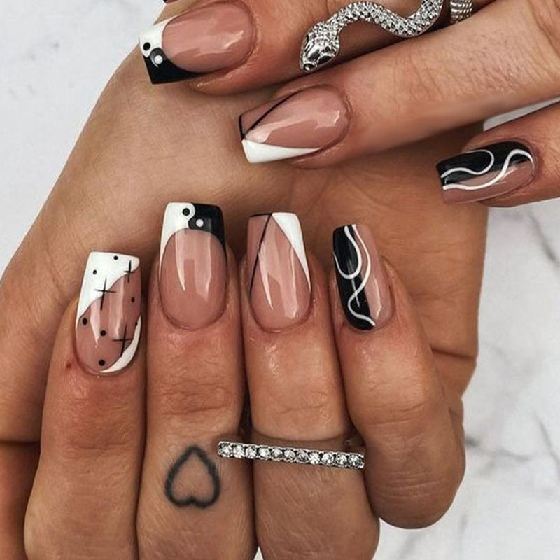 Monochrome Elegance Medium Coffin Black and White Press-On Nail Set with Abstract Art Design