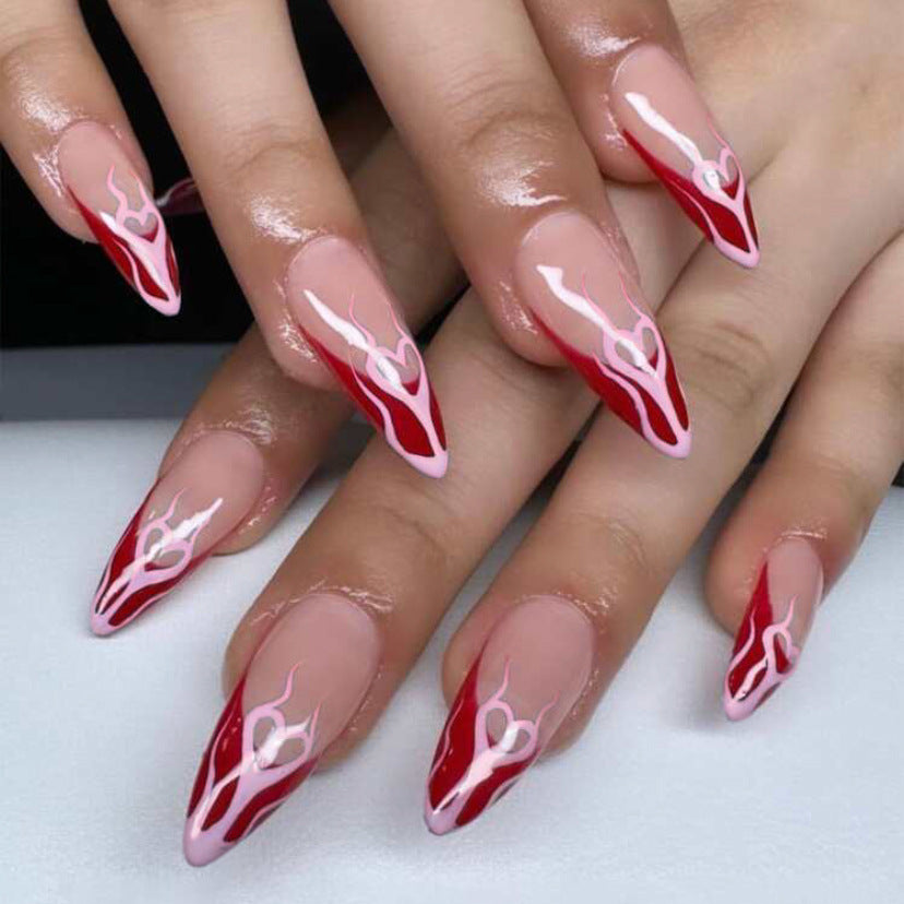 Flame Rendezvous Extra Long Almond Press On Nails Set in Glossy Red & White with Swirl Accents