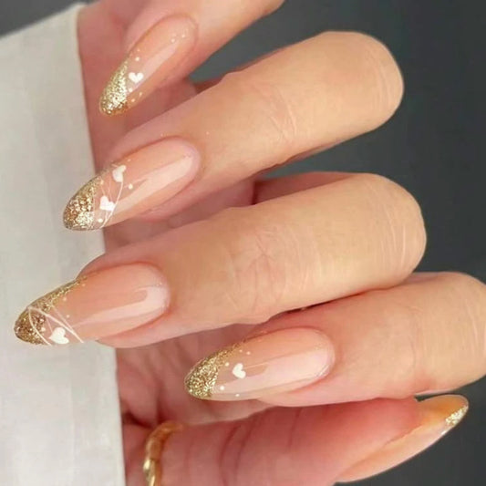Glittering Gala Medium Almond Beige Press On Nails with Gold Accents and Heart Design