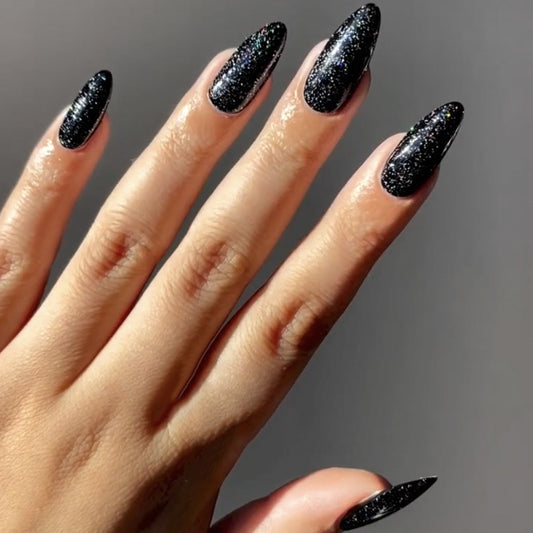 Stardust Glamour Long Almond Black Glitter Press On Nail Set for Fashionable Manicure