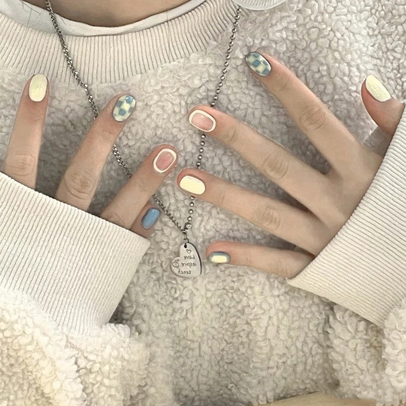 Whimsical Pastel Short Squoval Press-On Nails with Checkerboard and Abstract Art Design