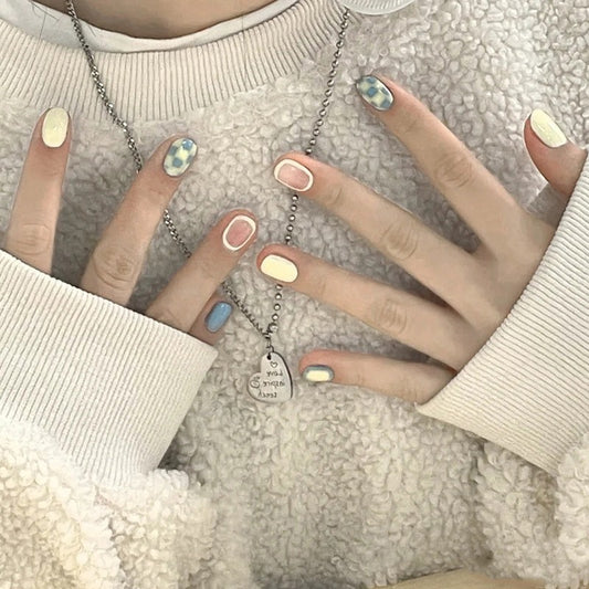 Whimsical Pastel Short Squoval Press-On Nails with Checkerboard and Abstract Art Design