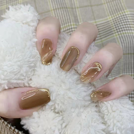 Chic Comfort Medium-Length Squoval Beige Press-on Nail Set with Gold Accents and Glossy Finish