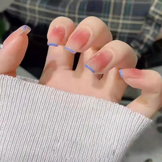 Sleek Skyline Medium-Length Square Clear Press-on Nail Set with Blue French Tip Detail