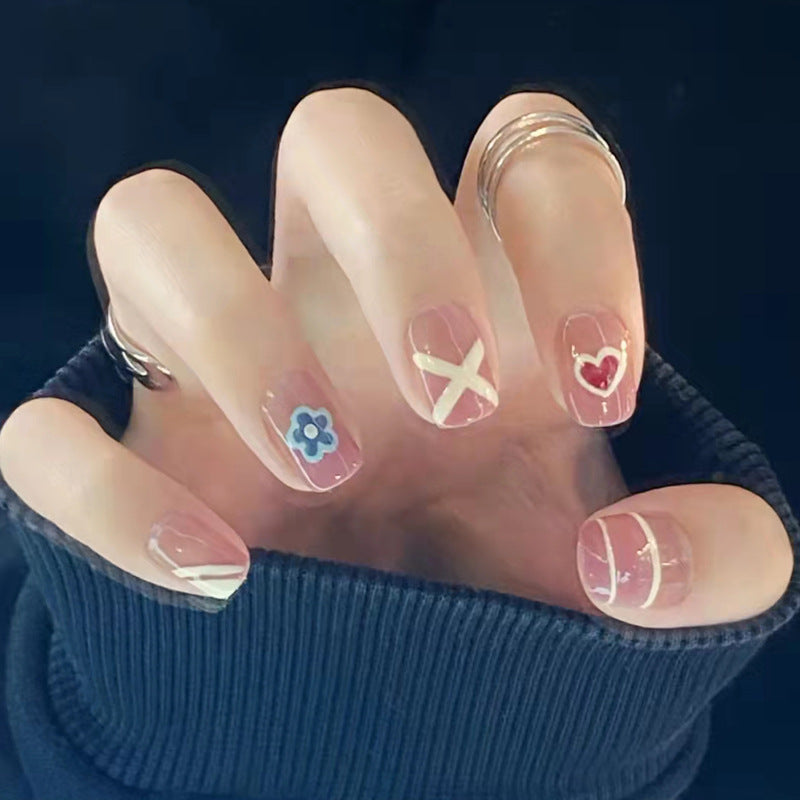 Playful Pastel Medium-Length Square Clear Press-on Nail Set with Pink Accents and Whimsical Designs