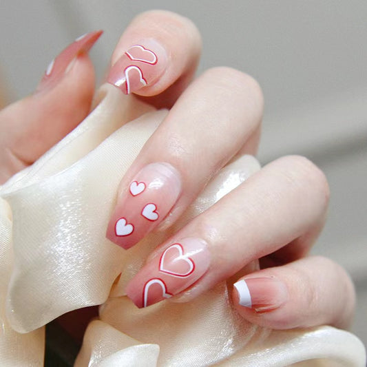 Romantic Escape Medium Coffin Pink Press-on Nails with Heart Detailing