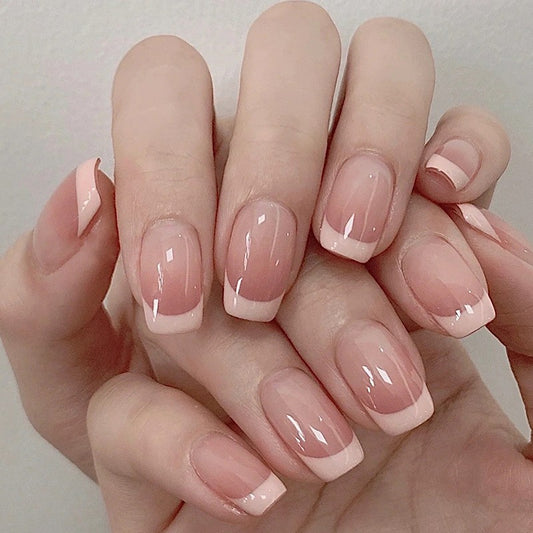 Chic Natural Medium Coffin French Tip Press-on Nails with Subtle Pink Overlay