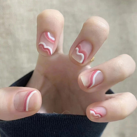 Cozy Cafe Short Squoval Pink Press On Nails with Abstract Wave Art Design