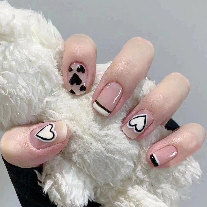 Cozy Chic Short Square Beige Press On Nails with Black Heart and Line Accents