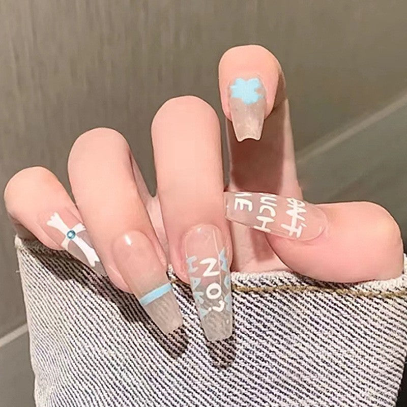 Trendsetting Extra Long Coffin Press On Nails in Sky Blue and Taupe with Abstract Art and Text Accents