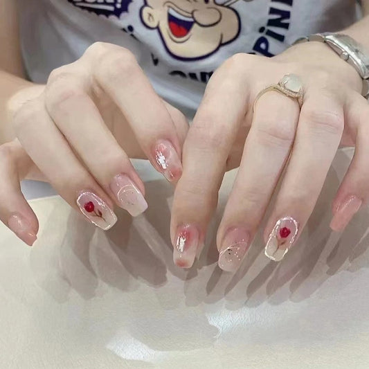 Elegant Charm Medium Square Press On Nails in Sheer Pink with Red Gemstone Accents and Delicate White Detailing