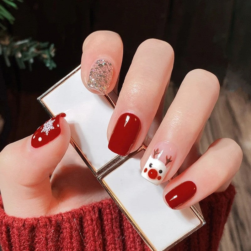 Yuletide Joy Medium Square Press On Nails in Classic Red with Sparkling Glitter and Reindeer Accent
