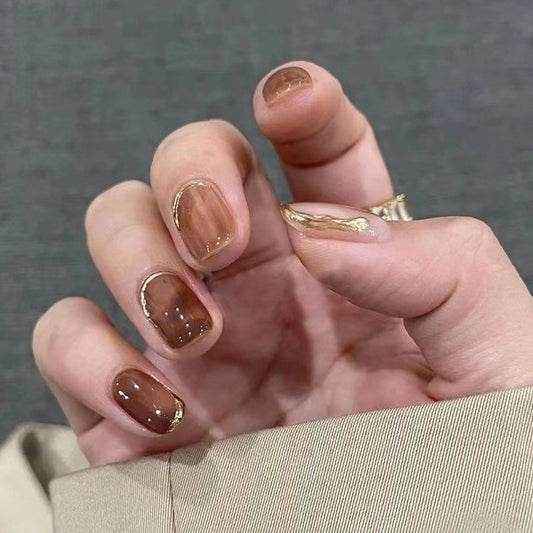Sophisticated Caramel Short Square Press On Nails with Gold Accents and Shimmer Finish