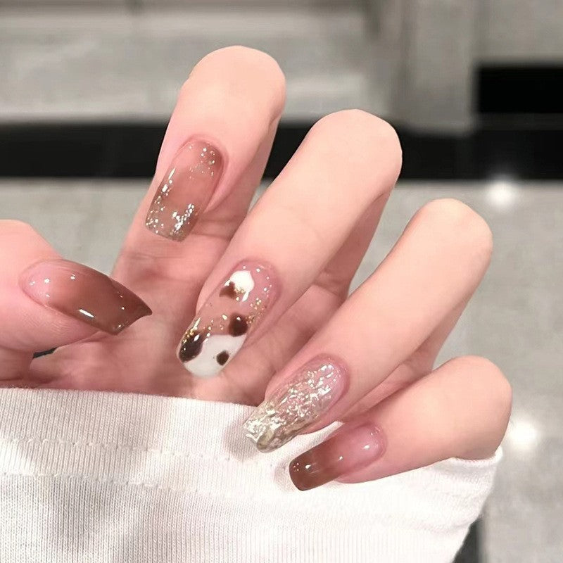 Elegant Mocha Long Coffin Taupe Press-On Nails with Cow Print and Gold Foil Accents