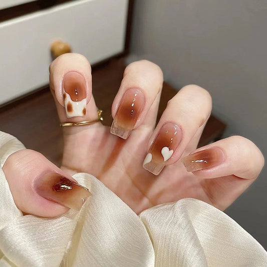 Sweetheart Mocha Long Coffin Beige Press-On Nails with Heart Accents and Glitter Cuticle Detail