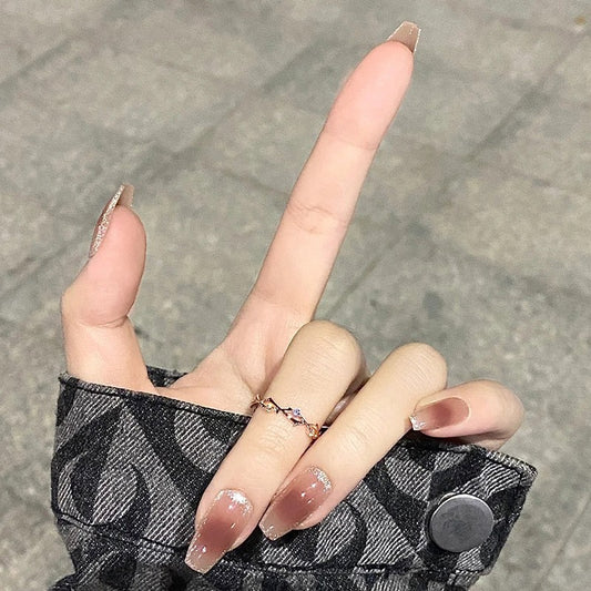 Glamorous Glitter Long Coffin Beige Press-On Nails with Rose Gold Sparkle Accents