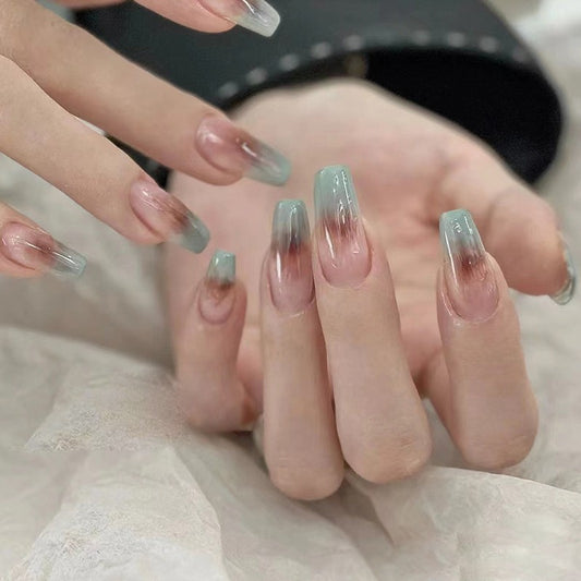Icy Tranquility Long Coffin Clear Press-On Nails with Frosted Tips and Subtle Glitter Detail