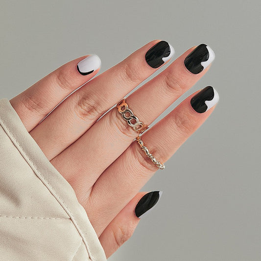 Thriving Short Squoval Black Abstract Press On Nails
