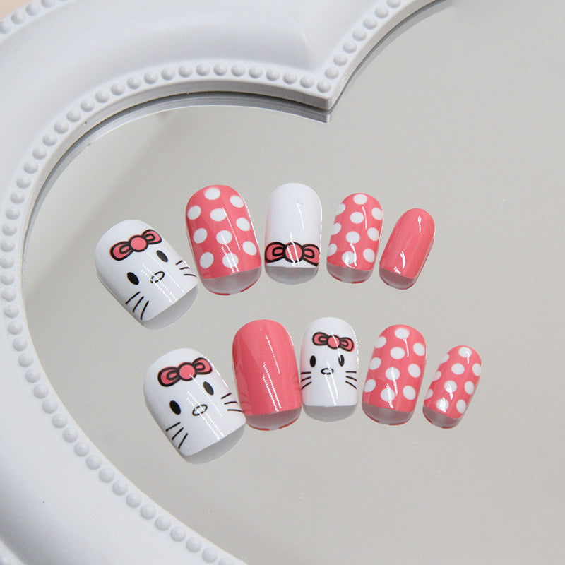 Enchanting Charm Short Square Oval Pink And White Press On Nails With Polka Dots And Cute Character Design
